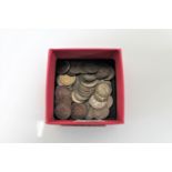 A box of a quantity of silver three penny bits