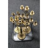 A tray of five 20th century brass candelabra
