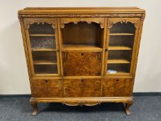 A twentieth century oak and walnut sideboard