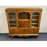 A twentieth century oak and walnut sideboard