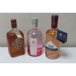 Three bottles of gin : Slingsby Rhubarb,