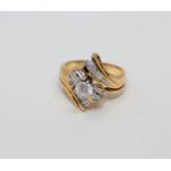 A 14ct gold diamond set ring, the principal diamond weighing an estimated 0.