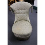 An Art Deco bedroom chair in a classical fabric