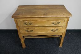 A blond oak two drawer chest