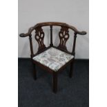 A Victorian mahogany corner chair