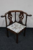 A Victorian mahogany corner chair