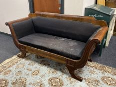 A continental mahogany scroll arm settee