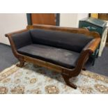 A continental mahogany scroll arm settee