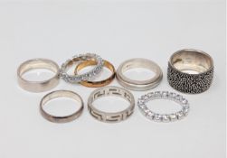 Eight silver dress rings