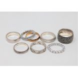 Eight silver dress rings