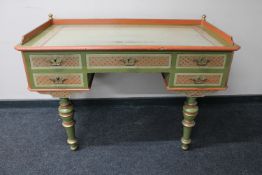 A late 19th century continental painted five drawer dressing table