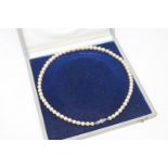A continental cultured pearl necklace on 14ct white gold diamond set clasp, length 46cm.