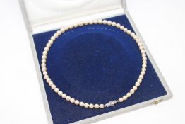 A continental cultured pearl necklace on 14ct white gold diamond set clasp, length 46cm.