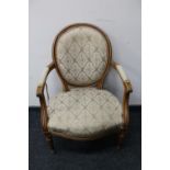 A salon armchair in classical fabric