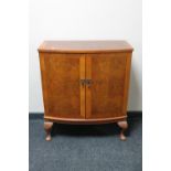 A reproduction mahogany audio cabinet on Queen Anne style legs
