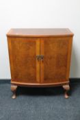 A reproduction mahogany audio cabinet on Queen Anne style legs
