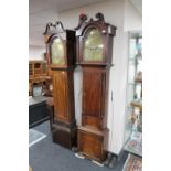 An antique mahogany longcase clock with later eight day movement with brass dial,