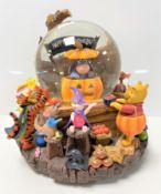 A Disney Winnie the Pooh & Friends musical and light up snow globe in original box