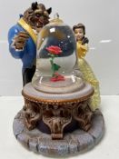 A Disney Beauty & The Beast musical and light up snow globe in original box