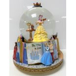 A Disney Princess Musical Revolving Snow Globe,