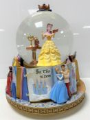 A Disney Princess Musical Revolving Snow Globe,