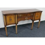An inlaid mahogany serpentine fronted sideboard CONDITION REPORT: 166cm wide by