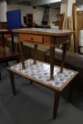 A mid 20th century pine tiled topped coffee table and a side table