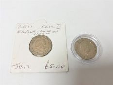 A rare un-dated 20p piece, together with a 2011 20p piece with error lump on neck.