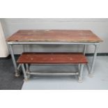 A reclaimed wood and scaffold board table and bench set