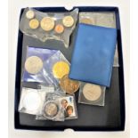 A collection of coins to include - United States of America paperweight, Decimal coin album, tokens,