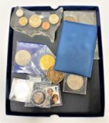 A collection of coins to include - United States of America paperweight, Decimal coin album, tokens,