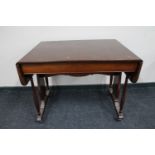 An early twentieth century mahogany sofa table