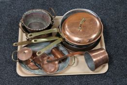 A tray of copper saucepans, copper dish,