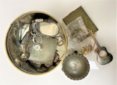 A tin containing plated compact, salt, wristwatch,