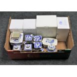 A box of Ringtons china : willow pattern coffee pots, storage jars, butter dishes,