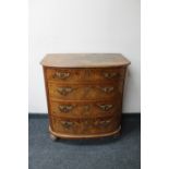 A 19th century continental mahogany and walnut bow fronted four drawer chest