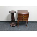 A mahogany Queen Anne style three drawer bedside chest together with a mahogany torchere