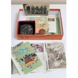A box of WWI era postcards including military, loose stamps, St.