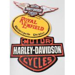 Three cast iron signs : Two Harley Davidson,