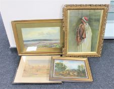 An antiquarian gilt framed oil of a figure in Arabic dress,