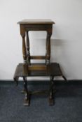 An oak flap sided refectory occasional table and a plant stand