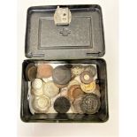 A miniature metal money box in the form of a safe containing Victorian and later coins,