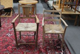 Two antique rush seated armchairs