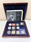 A coin box containing twelve coins - Crowns, Battle of Trafalgar, Victory,