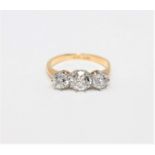 An 18ct gold three-stone diamond ring,