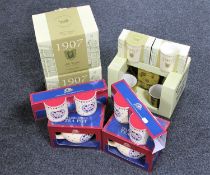 Two boxed Ringtons 1907 commemorative teapots, two boxed Ringtons 1907 mugs,