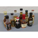 Ten miniature bottles of whisky, Bell's Dewar's,