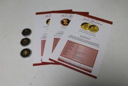 Three 24ct gold miniature commemorative coins; Henry VIII, Isambard Kingdom Brunel and Richard II,