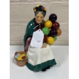A Royal Doulton figure : The Old Balloon Seller HN 1315