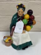 A Royal Doulton figure : The Old Balloon Seller HN 1315